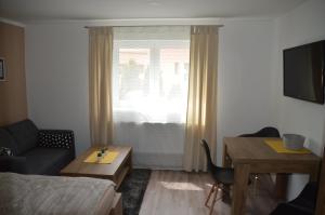 Posezení v ubytování Apartmány Máchovo jezero