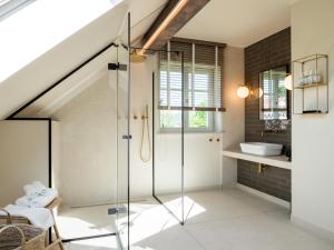 Koupelna v ubytování Alpenloge Design Hotel + 37 fotografií