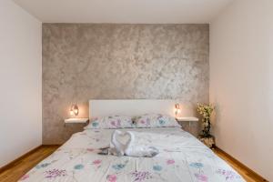 Postel nebo postele na pokoji v ubytování Apartments Vila DK