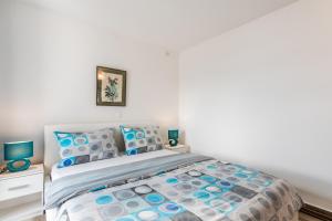 Postel nebo postele na pokoji v ubytování Apartments Vila DK