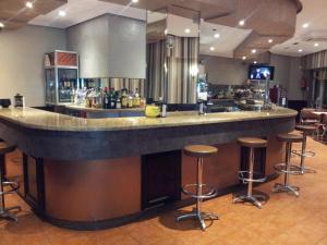 Lounge nebo bar v ubytování Alojamientos Río Cares