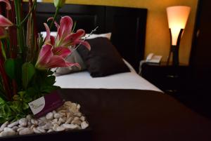 Krevet ili kreveti u jedinici u okviru objekta Hotel Suite Azomali