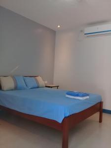 Postel nebo postele na pokoji v ubytování D & B BLUESTAR BEACH RESORT