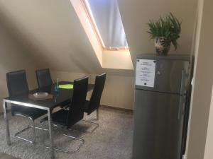 Kuchyňa alebo kuchynka v ubytovaní Tommy Apartman 2.0