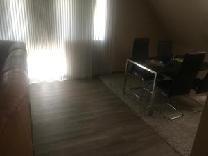 Televízia a/alebo spoločenská miestnosť v ubytovaní Tommy Apartman 2.0