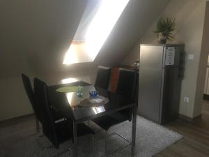 Kuchyňa alebo kuchynka v ubytovaní Tommy Apartman 2.0