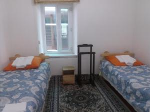Postel nebo postele na pokoji v ubytování Macedon Guest House