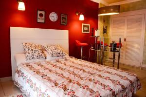 Postel nebo postele na pokoji v ubytování Cozy Studio Las Americas + 37 fotografií