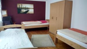 Voodi või voodid majutusasutuse "Klein und Fein"-Monteurzimmer Pohlheim toas