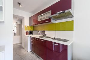 Kuchyň nebo kuchyňský kout v ubytování Apartament SYNERGIA