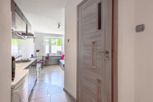 Postel nebo postele na pokoji v ubytování Apartament SYNERGIA