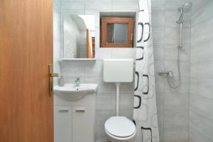 Koupelna v ubytování Apartment Mitar 1271
