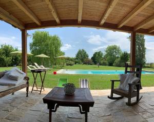 The swimming pool at or close to the green home