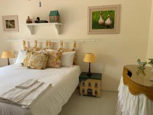 A bed or beds in a room at the green home