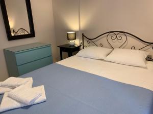 Ένα ή περισσότερα κρεβάτια σε δωμάτιο στο Christi Apartments A