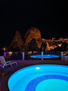 The swimming pool at or near Hermes Cave Hotel