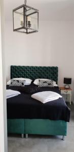 Postel nebo postele na pokoji v ubytování Apartments Perina