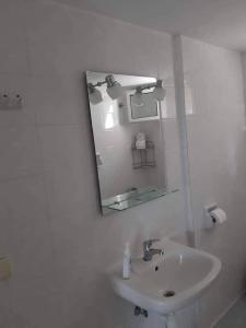 Ванна кімната в Ianos