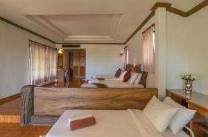 Postelja oz. postelje v sobi nastanitve Lanta Manda Resort