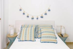 Postel nebo postele na pokoji v ubytování Hostal Beni