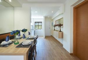 a dining room with a table and chairs at Ericeira Sunset Lifestyle II in Ericeira