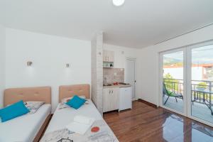 Kuchyň nebo kuchyňský kout v ubytování Apartmani Afterglow