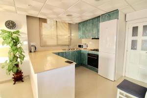 Kuchyň nebo kuchyňský kout v ubytování Appartement Salou LOCARMAR - Toni Brusseles