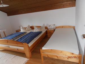 Letto o letti in una camera di Haus Schneider
