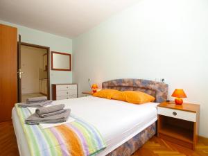 Postel nebo postele na pokoji v ubytování Apartments Sebastian 1842