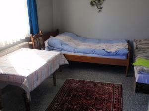 Łóżko lub łóżka w pokoju w obiekcie Noclegi16