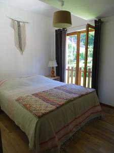 Postel nebo postele na pokoji v ubytování Gîte de la Mésange