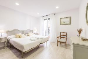 Posteľ alebo postele v izbe v ubytovaní Puerto - Local Rentss