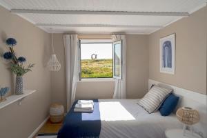 Postel nebo postele na pokoji v ubytování Beachliving Esmoriz
