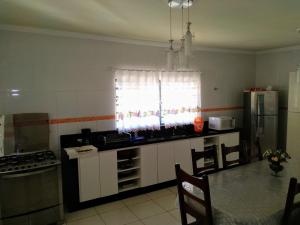 Kuchyň nebo kuchyňský kout v ubytování Chácara reis