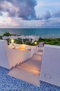 a view of the ocean from a villa at Baia Delphis Resort in Vasto