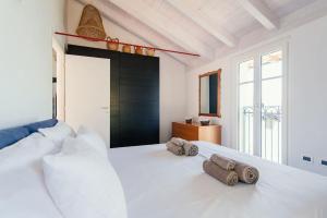 En eller flere senge i et værelse på Como Lake & Mountain