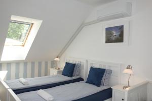 Postel nebo postele na pokoji v ubytování Lednicko-valtický apartmán