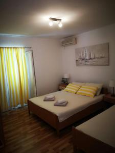 Posteľ alebo postele v izbe v ubytovaní Apartment Karla - Zubovići