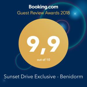 a yellow circle with the text guest review awards and the sunburst drive exclusive at Sunset Drive Exclusive - Benidorm in Benidorm