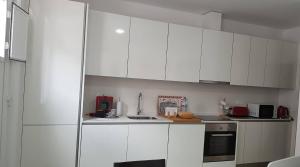 Η κουζίνα ή μικρή κουζίνα στο Apartamento Gaivota