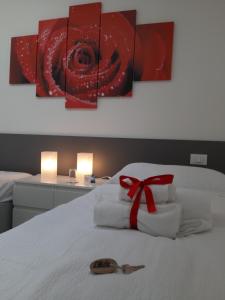 Postel nebo postele na pokoji v ubytování B&B Elisè