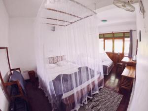 Katil atau katil-katil dalam bilik di Lakshmis Hotel Ella