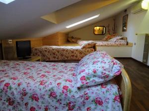 Uma cama ou camas num quarto em Le Mimose B&B