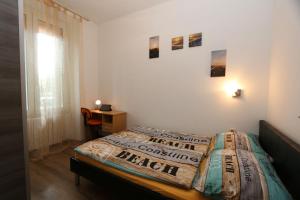 Posteľ alebo postele v izbe v ubytovaní Apartment Krimeja
