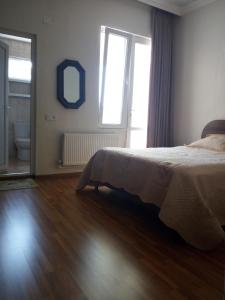 Voodi või voodid majutusasutuse Small guest house toas