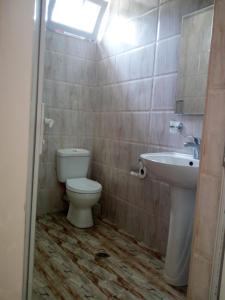 Vannituba majutusasutuses Small guest house