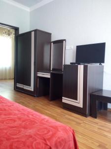 TV a/nebo společenská místnost v ubytování Small guest house