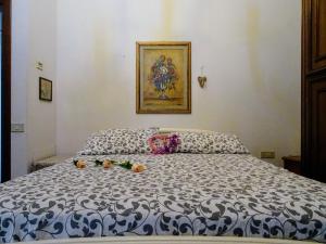 Postel nebo postele na pokoji v ubytování Le Mimose B&B