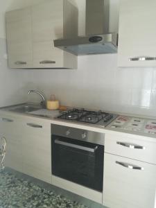 Kuchyň nebo kuchyňský kout v ubytování CASA CHINAPPI