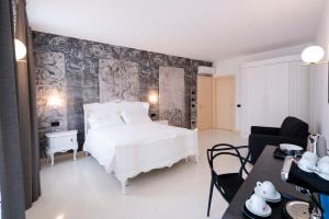 Posteľ alebo postele v izbe v ubytovaní Antica Pusterla Relais de Charme